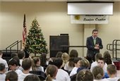 Mayor Gerry Scharfenberger speaking to students and parents at the Project Plus Graduation on Thursday, 12/14