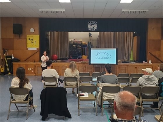 Planning Director Amy Citrano talks to the meeting attendees