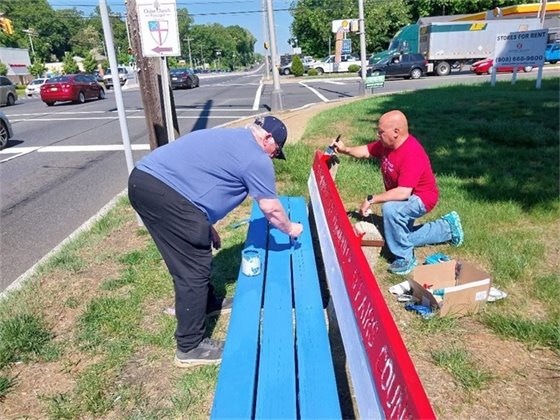 Middletown Community Affairs Council members painting their bench