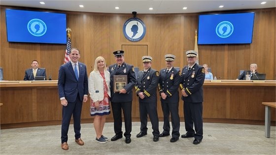 Group Photo of Distinguished Citizen of the Year with Mayor, Fire Chiefs, and Wife
