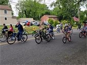 Bike riders and Scouts at Memorial Day Parade