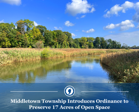 Photo of River Plaza land that is being preserved for open space with title